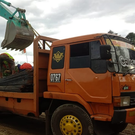 Pengiriman Besi Menggunakan Tronton Trailer